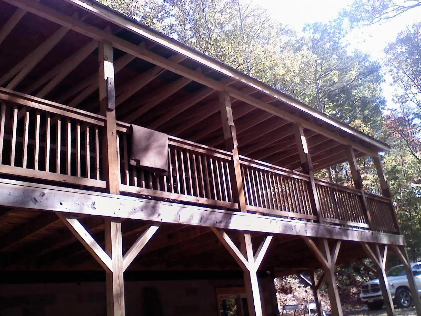 Timber framing under a new elevated porch and deck — Roof Leak Repair in Creola by Roofing Brothers